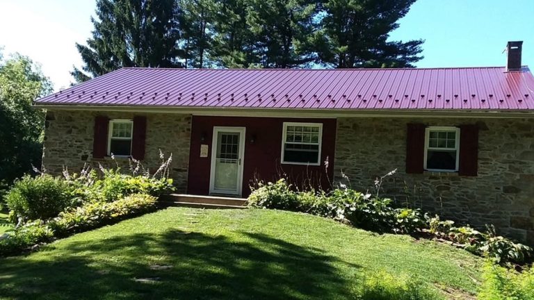 Burgundy Corrugated Metal Roof providing durability, weather protection, and energy efficiency